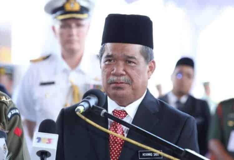 Malaysia Defence Minister Mohamad Sabu at repatriation ceremony. Source: Yahoo News, 20 August 2018