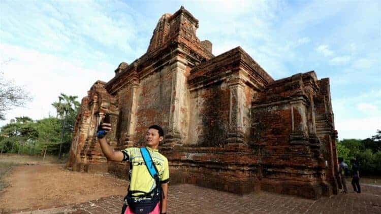 Cyclist taking selfie in Bagan. Source: Al Jazeera, 20190804