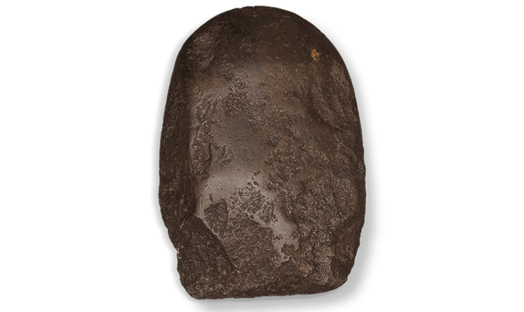 The round axe discovered at Tanjong Karang (now Tuas) in Singapore (Accession no. A1277). Collection of the National Museum of Singapore, National Heritage Board.